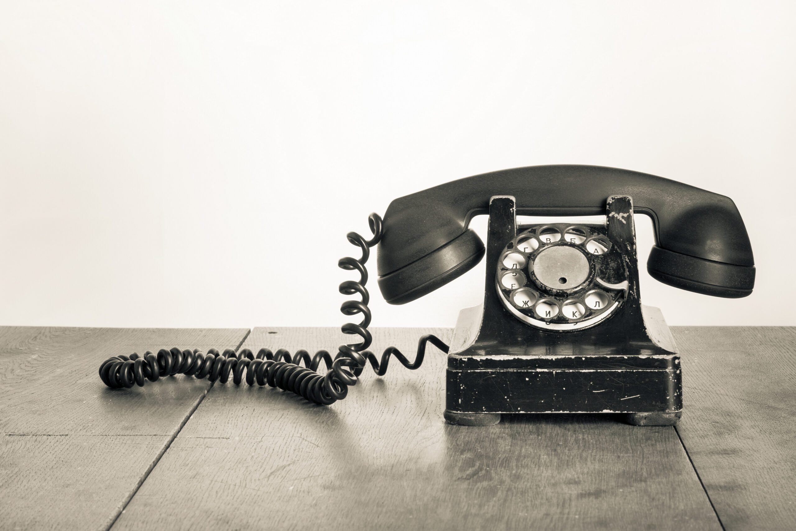 Vintage telephone on a wooden table
